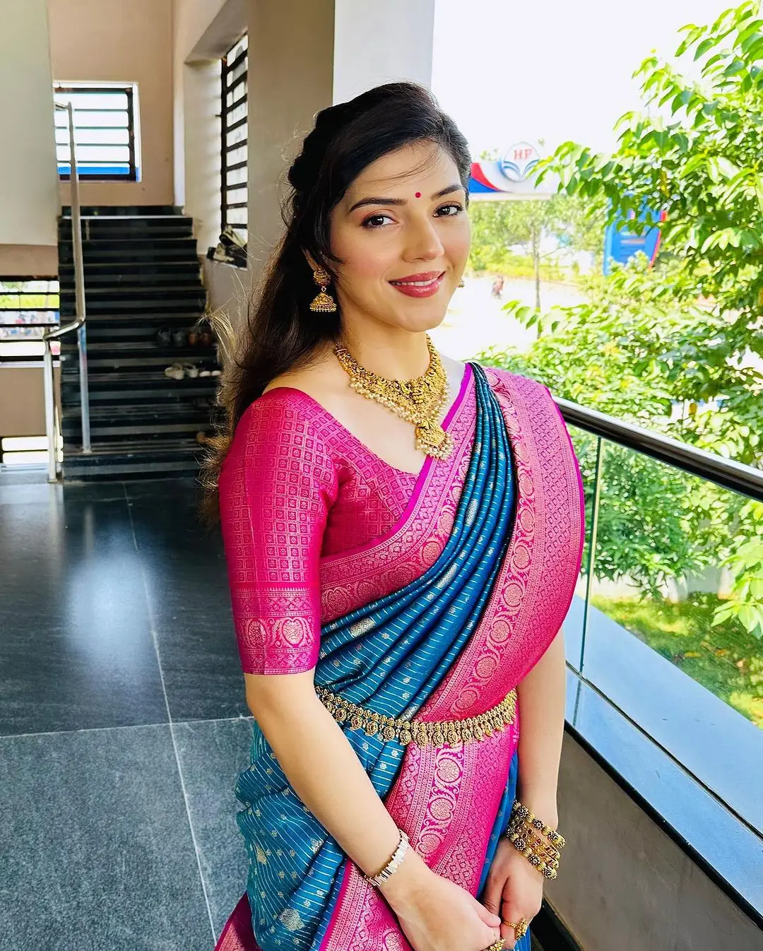 MEHREEN PIRZADA IN SOUTH INDIAN TRADITIONAL BLUE SAREE PINK BLOUSE